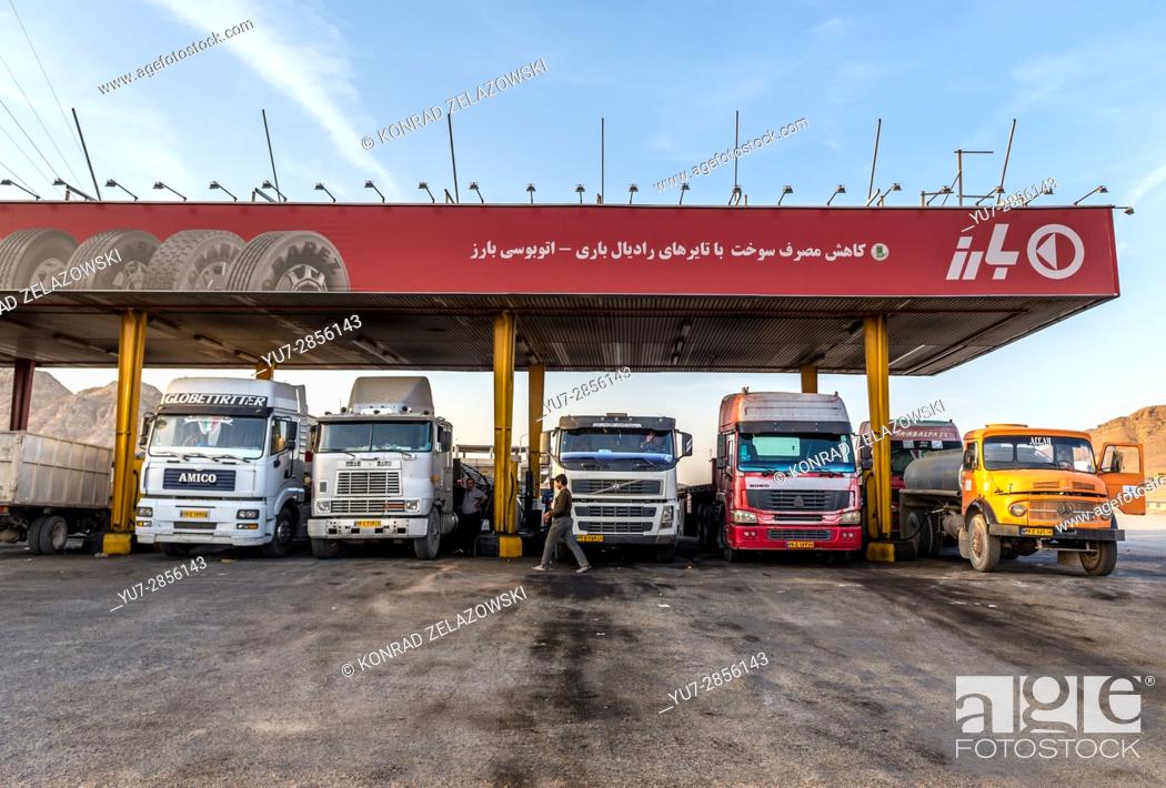 Stock Photo: Row of trucks on a gas station in Isfahan Province of Iran.