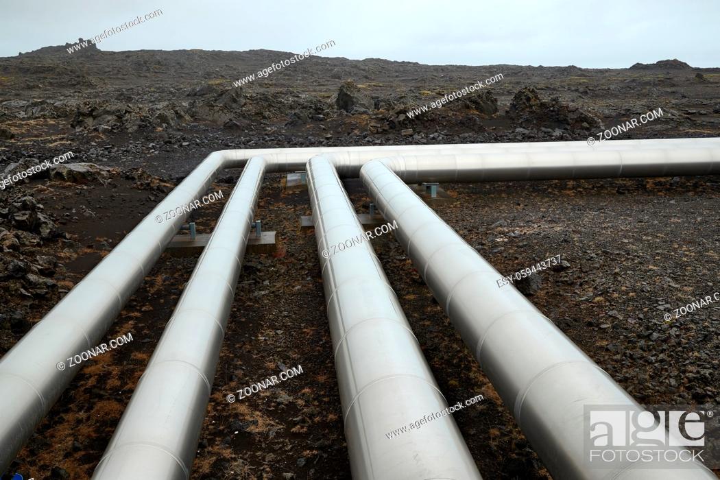 Stock Photo: Pipelines in Iceland, geothermal heat transport on volcanic terrain.