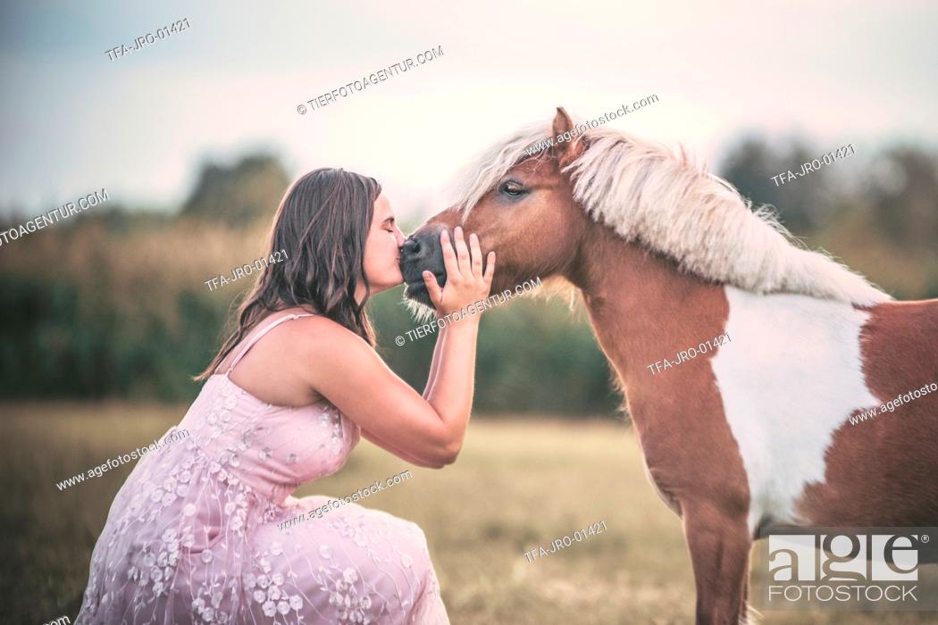 Stock Photo: woman and Mini Shetland Pony.