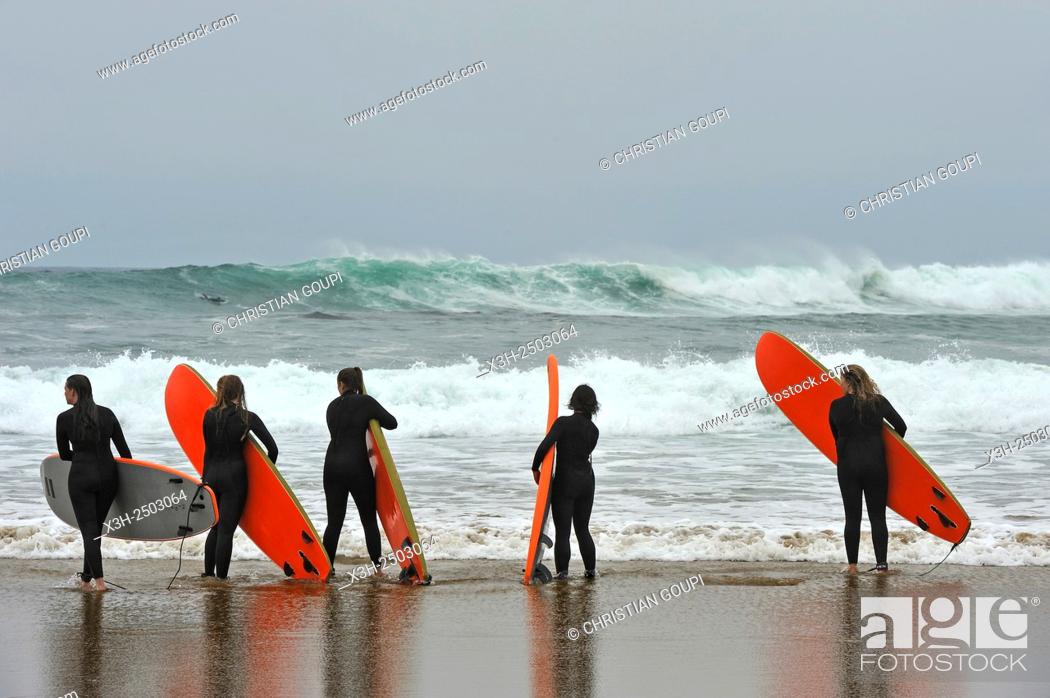 Stock Photo: surf class on Zurriola beach, district of Gros, San Sebastian, Bay of Biscay, province of Gipuzkoa, Basque Country, Spain, Europe.