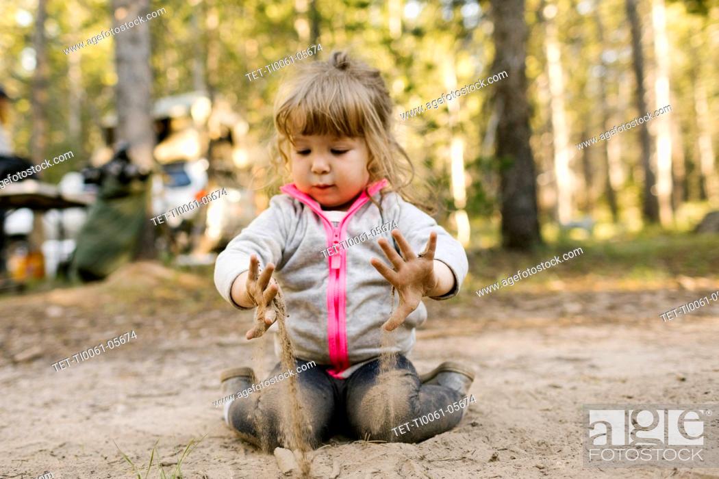 Stock Photo: Girl (2-3) playing in sand, Wasatch Cache National Forest.