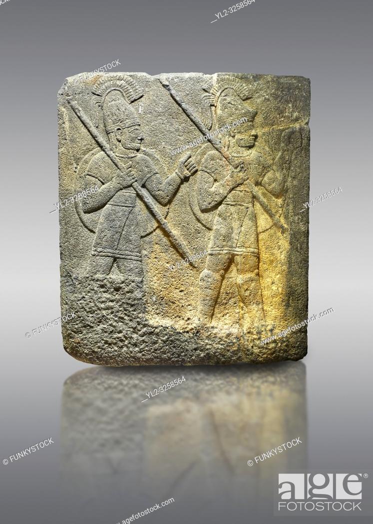 Stock Photo: Hittite relief sculpted orthostat stone panel of Herald's Wall. Limestone, Karkamis, (Kargamis), Carchemish (Karkemish), 900-700 B.C. Military parade.