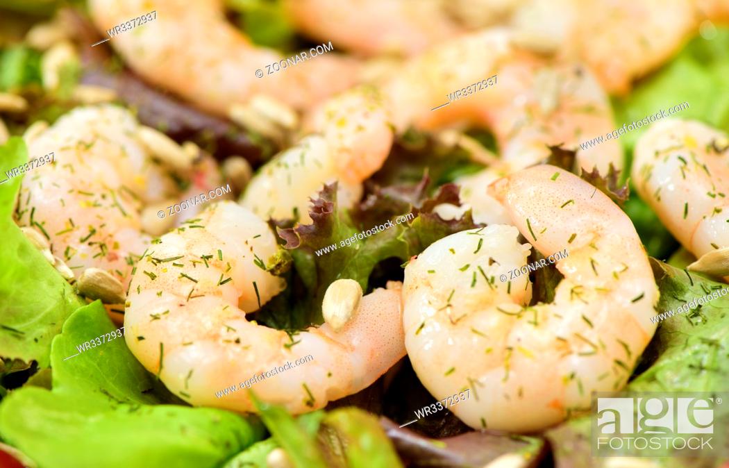 Stock Photo: seafood salad with fresh shrimps and tomatoes.