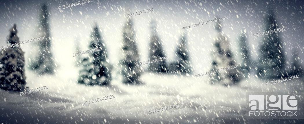 Imagen: Winter forest made of miniature toy trees. Fairytale scenery, focus on snow foreground. Panoramic, banner.