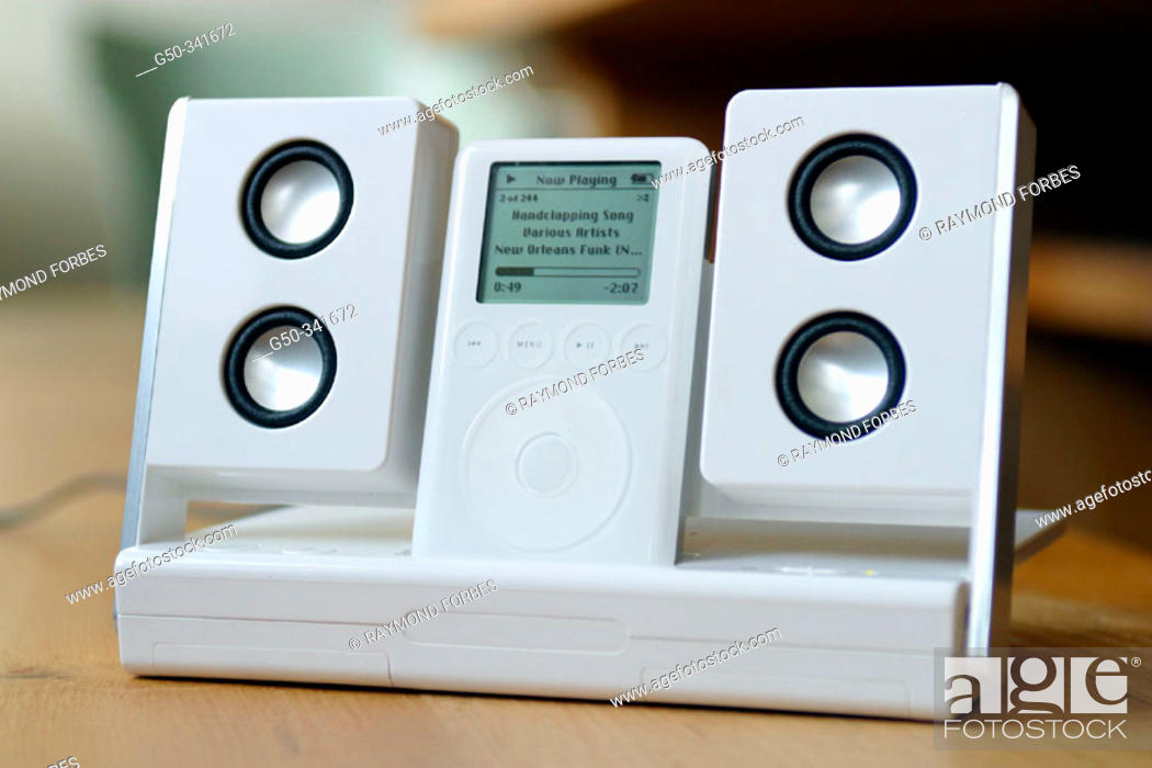 Stock Photo: Apple iPod MP3 player with speaker.