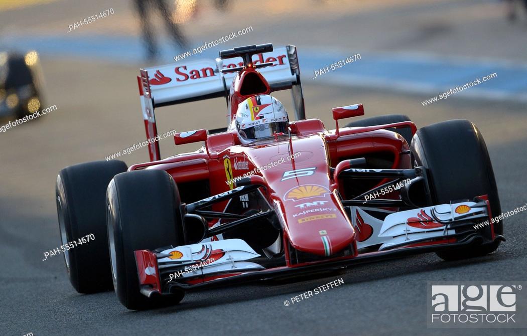 Stock Photo: German Formula One driver Sebastian Vettel of Scuderia Ferrari steers the new SF15-T during the training session for the upcoming Formula One season at the.