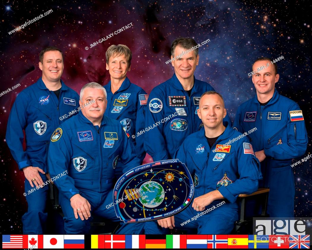 Stock Photo: The Expedition 52 crew members (front row, from left) are Commander Fyodor Yurchikhin and NASA astronaut Randy Bresnik. In the back row (from left) are.