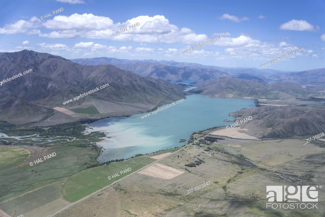 Stock Photo: aerial, from a glider, of Benmore lake, shot in bright spring light from west, Canterbury, South Island, New Zealand.