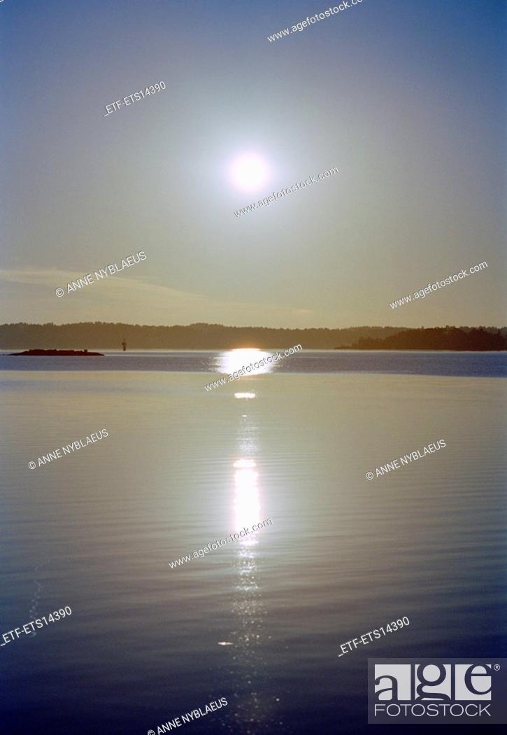 Stock Photo: Morning sun reflected on the surface of the water Sweden.