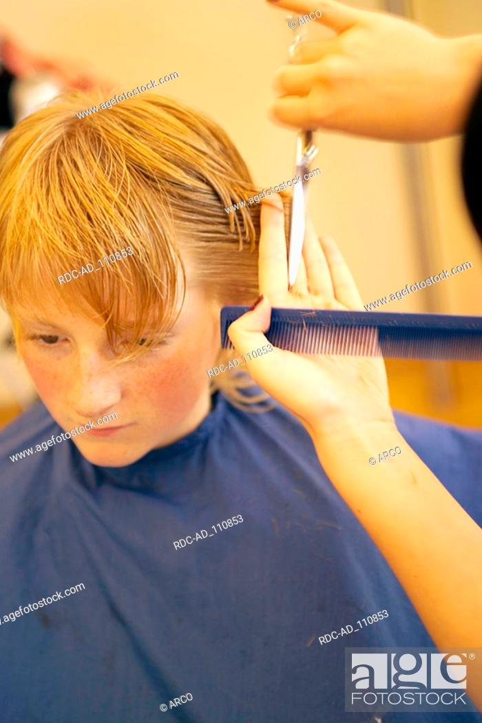Boy having his hair cut / hairdresser scissors comb, Stock Photo, Picture  And Rights Managed Image. Pic. RDC-AD_110853 | agefotostock