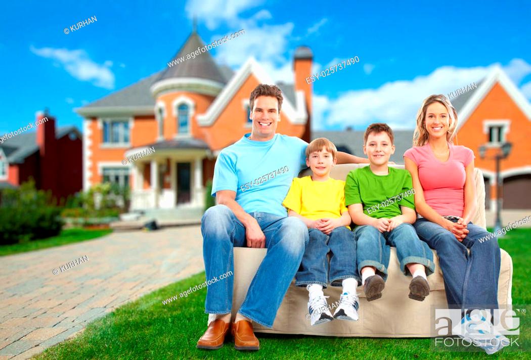 Happy family near new home. Real estate background, Stock Photo, Picture  And Low Budget Royalty Free Image. Pic. ESY-025737490 | agefotostock