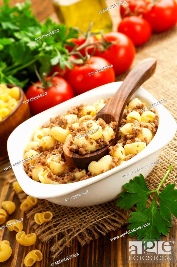 Stock Photo: Pasta with minced meat in the ceramic pot.