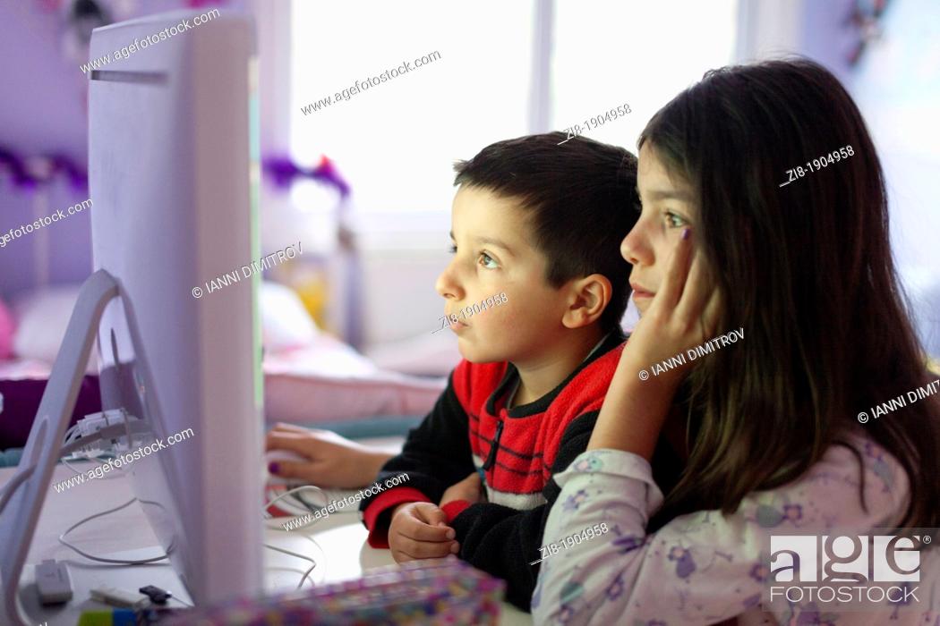 Stock Photo: Children playing computer games together.