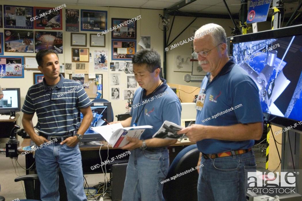 Stock Photo: Japan Aerospace Exploration Agency (JAXA) astronaut Koichi Wakata (center), Expedition 18 flight engineer; NASA astronauts John L.
