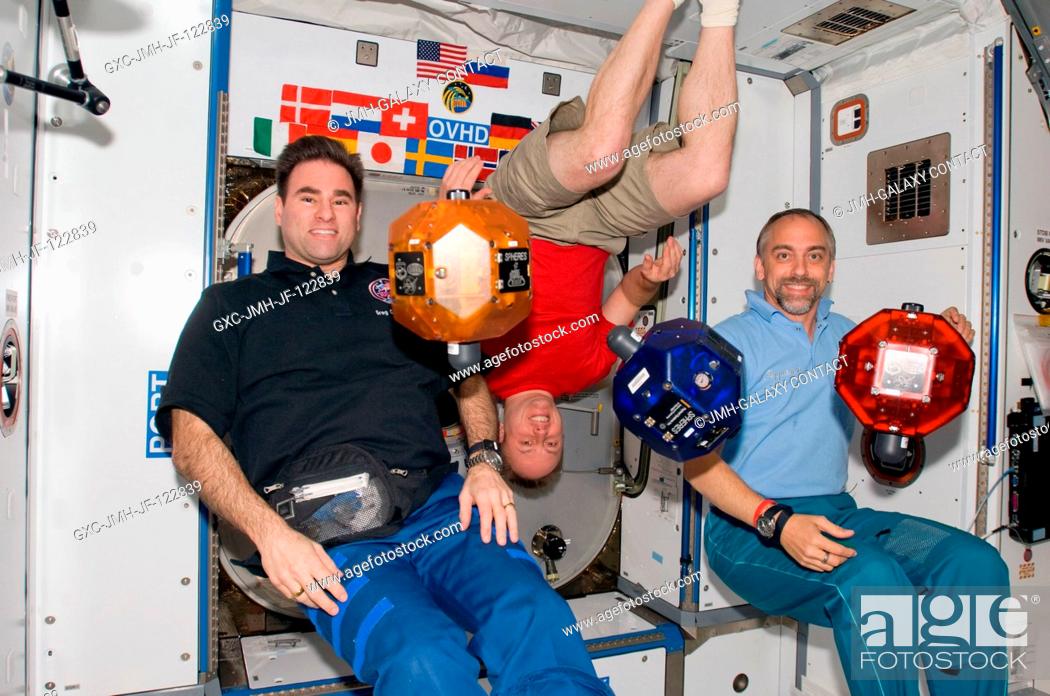 Stock Photo: Astronauts Greg Chamitoff (left), Michael Fincke, Expedition 18 flight engineer and commander, respectively; and American spaceflight participant Richard.