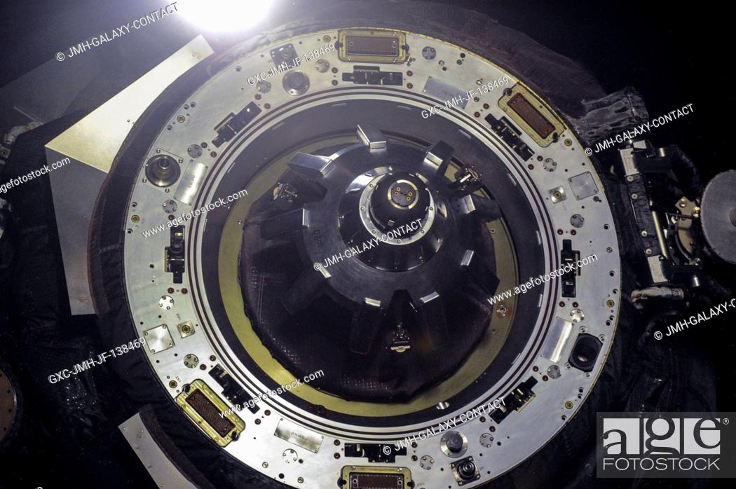 Stock Photo: This close-up view shows the docking mechanism of the unpiloted Russian ISS Progress 52 resupply ship as it undocks from the International Space Station's Pirs.