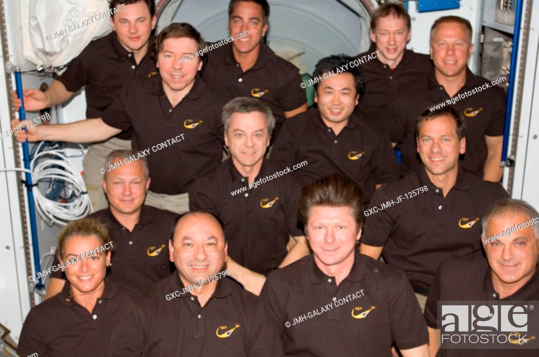 Stock Photo: These 13 space fliers are spending more than a week together onboard the International Space Station, marking a population record on the orbital outpost.