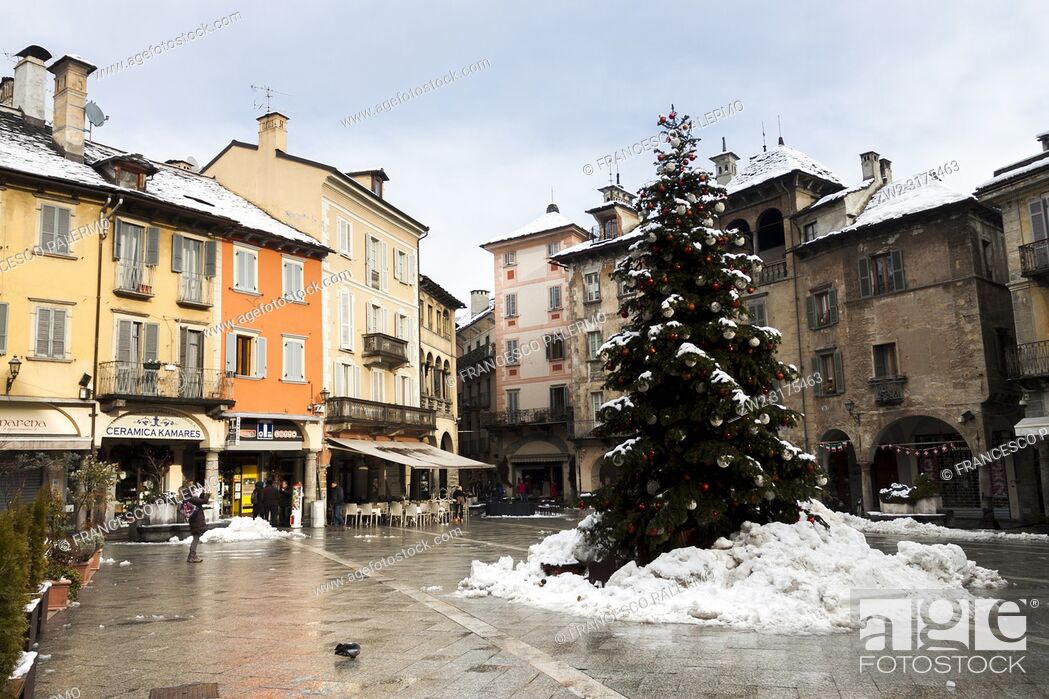Stock Photo: Christmas decorations at the Market Square after the snowstorm. Domodossola, Piedmont. Italy.
