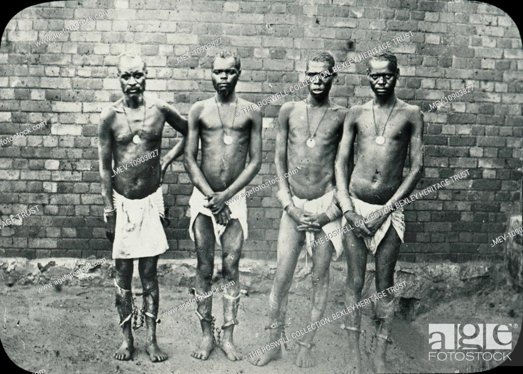 Stock Photo: Black and white lantern Slide of Mashonaland Prisoners - British South Africa. Part of Box 288, British South Africa. Boswell Collection.