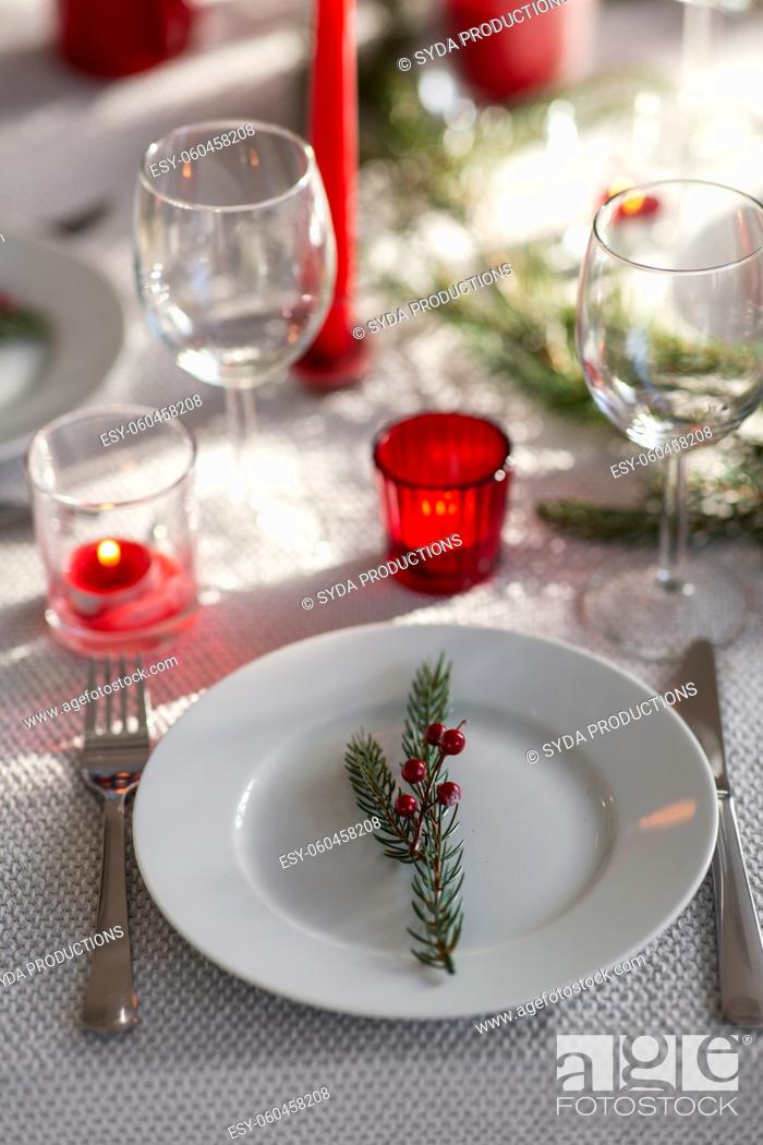 Photo de stock: christmas dinner party table serving at home.