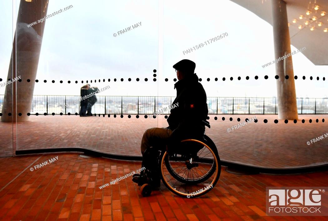 Stock Photo: A wheelchair user in the city, Germany, city of Hamburg, 05. March 2019. Photo: Frank May (model released) | usage worldwide.