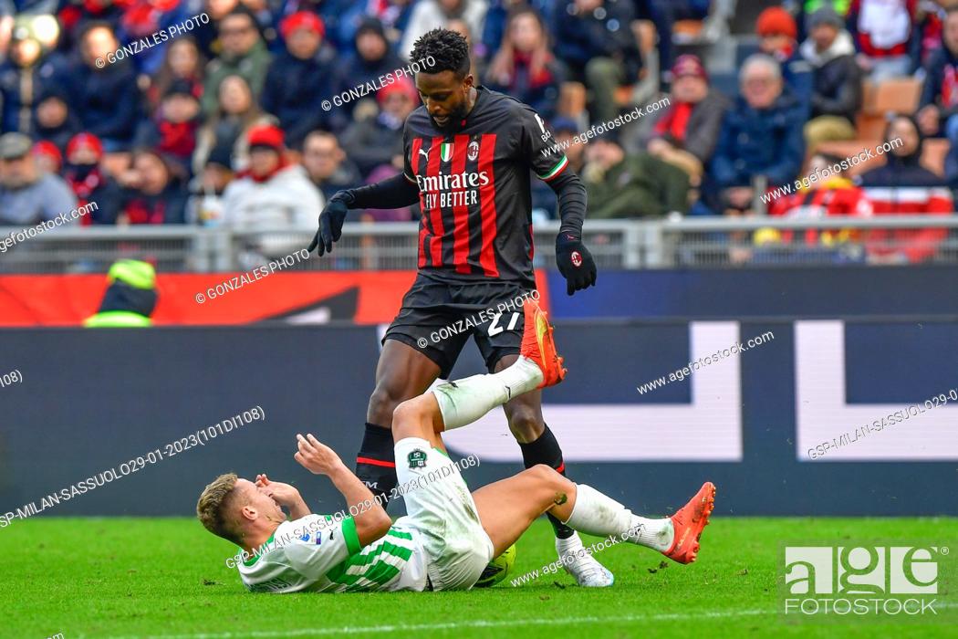 Stock Photo: Milano, Italy. 29th, January 2023. Divock Origi (27) of AC Milan and Davide Frattesi (16) of Sassuolo seen in the Serie A match between AC Milan and Sassuolo at.