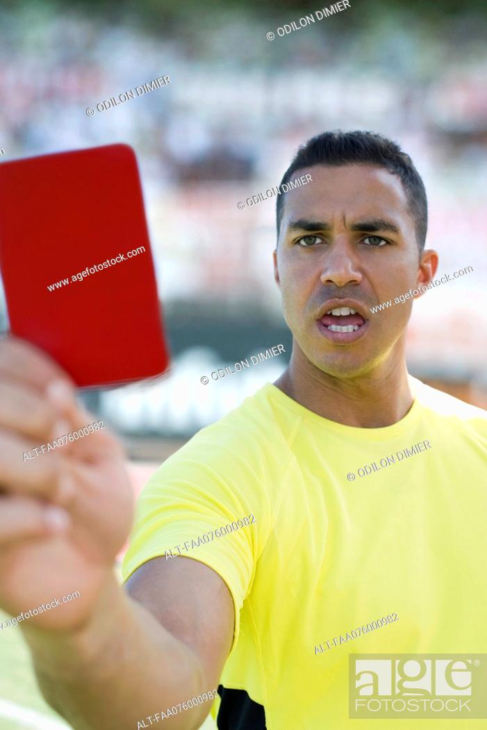 Photo de stock: Referee holding red card.