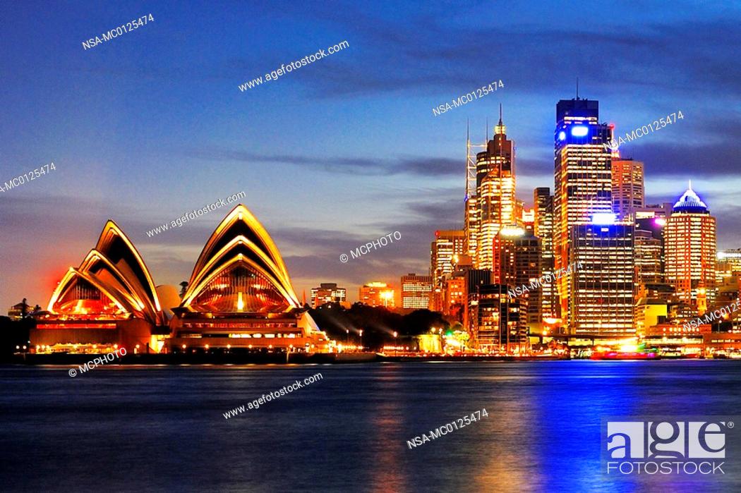 Stock Photo: Skyline of Sydney with Sydney Opera during the blue hour, Circular Quay, Sydney Cove, Sydney, New South Wales, Australia, February 2007.