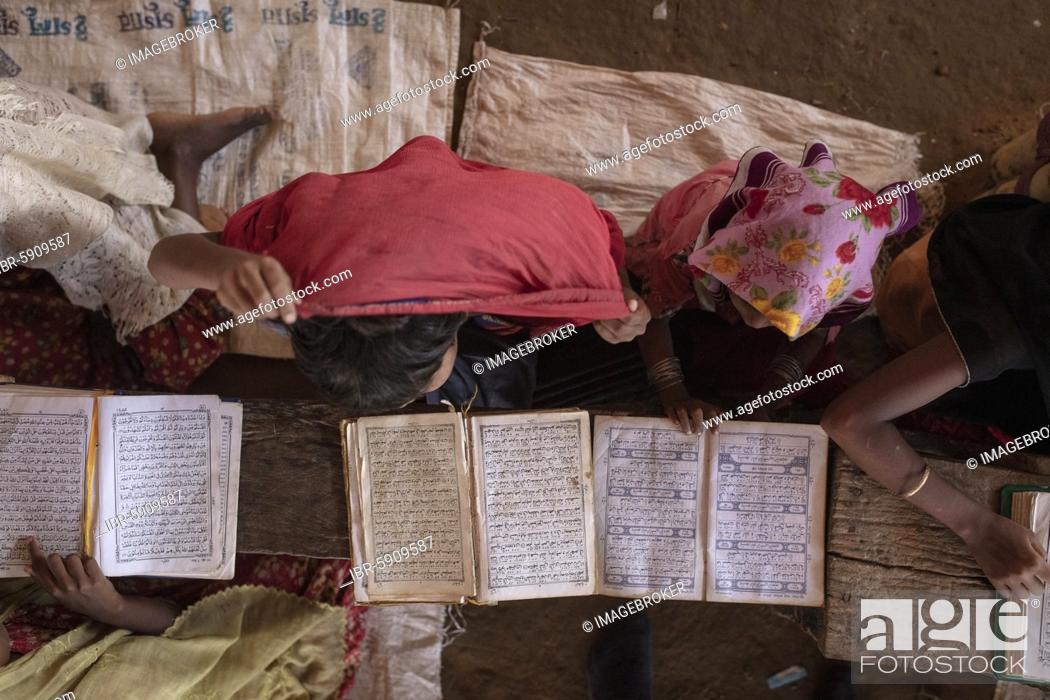 Stock Photo: Girls reading in a madrasah, Koran school, camp for Rohingya refugees from Myanmar, Kutupalong, Cox Bazar, Bangladesh, Asia.