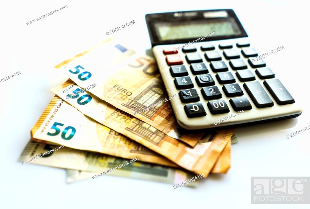 llegada civilización Capilla Banknotes and Calculator, Euro Banknotes on White Background, Money,  Finance, Tax, Stock Photo, Picture And Low Budget Royalty Free Image. Pic.  ESY-054434108 | agefotostock