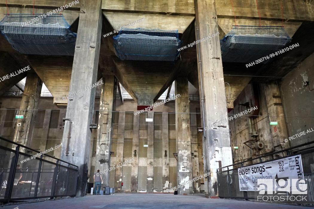 Stock Photo: 14 July 2020, Berlin: View into the former combined heat and power plant of Friedrichshain, where the installation sound installation ""Eleven Songs"" can be.