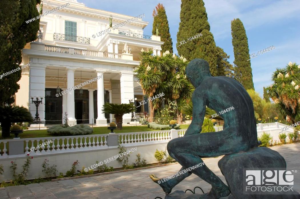 Stock Photo: Achilleion palace with the bronze Mercury statue in the foreground  Corfu island, Greece.