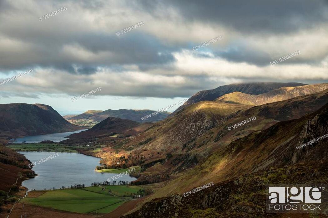 Stock Photo: Epic Autumn Fall landscape of Buttermere and Crummock Water surrounded by mountain peaks in Lake District.
