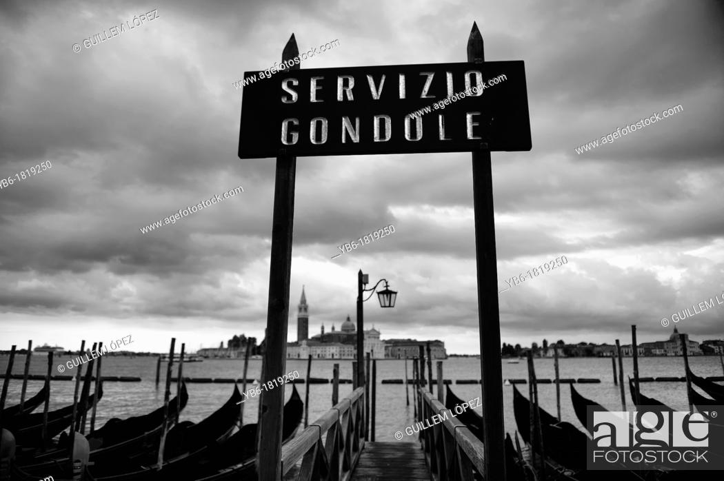 Stock Photo: Servizio Gondola sign but the San Marco's waterfront, Venice, Italy.