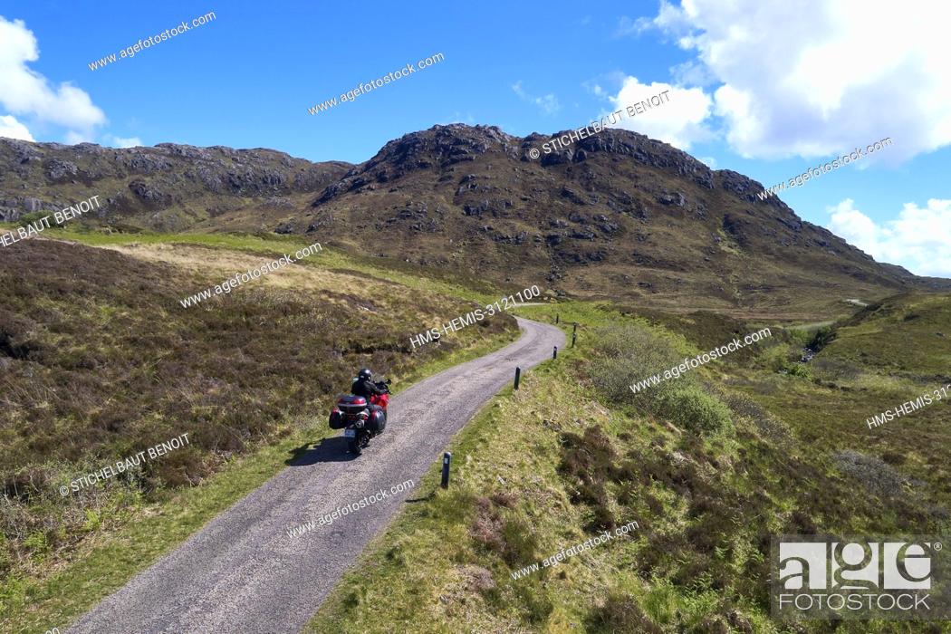 Stock Photo: United Kingdom, Scotland, Highland, Ardnamurchan peninsula, motorbike on the road to Sanna (aerial view).
