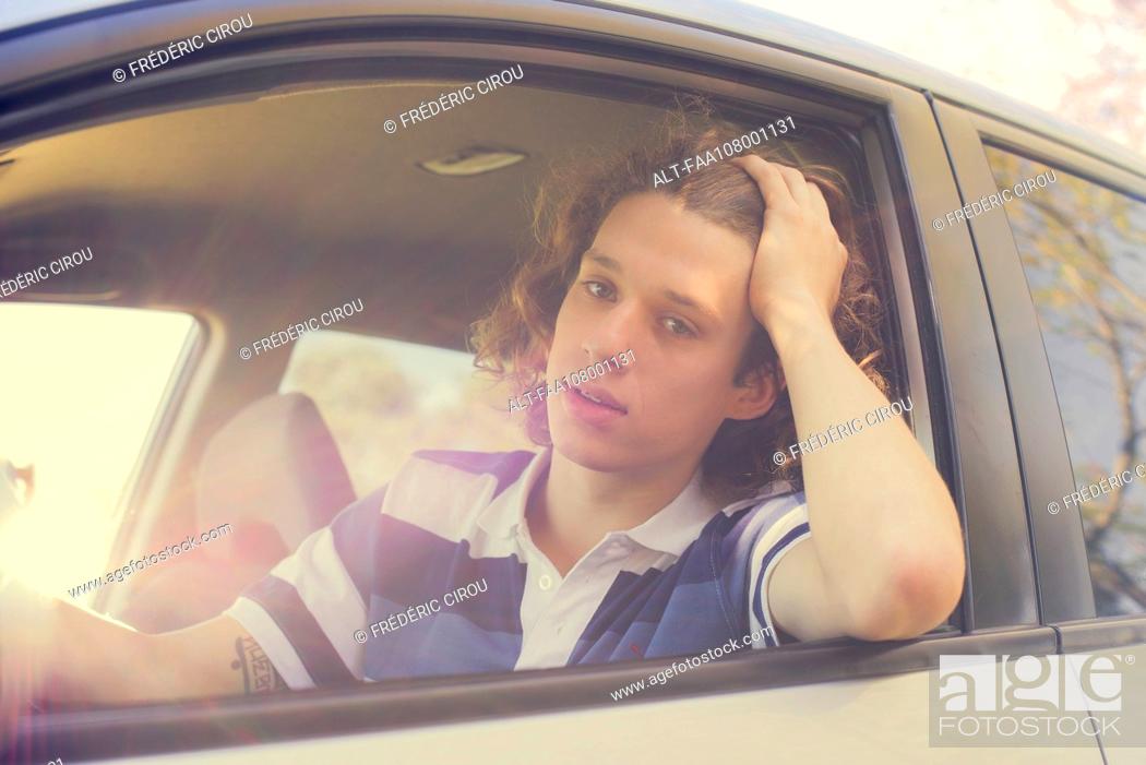 Stock Photo: Man driving car.