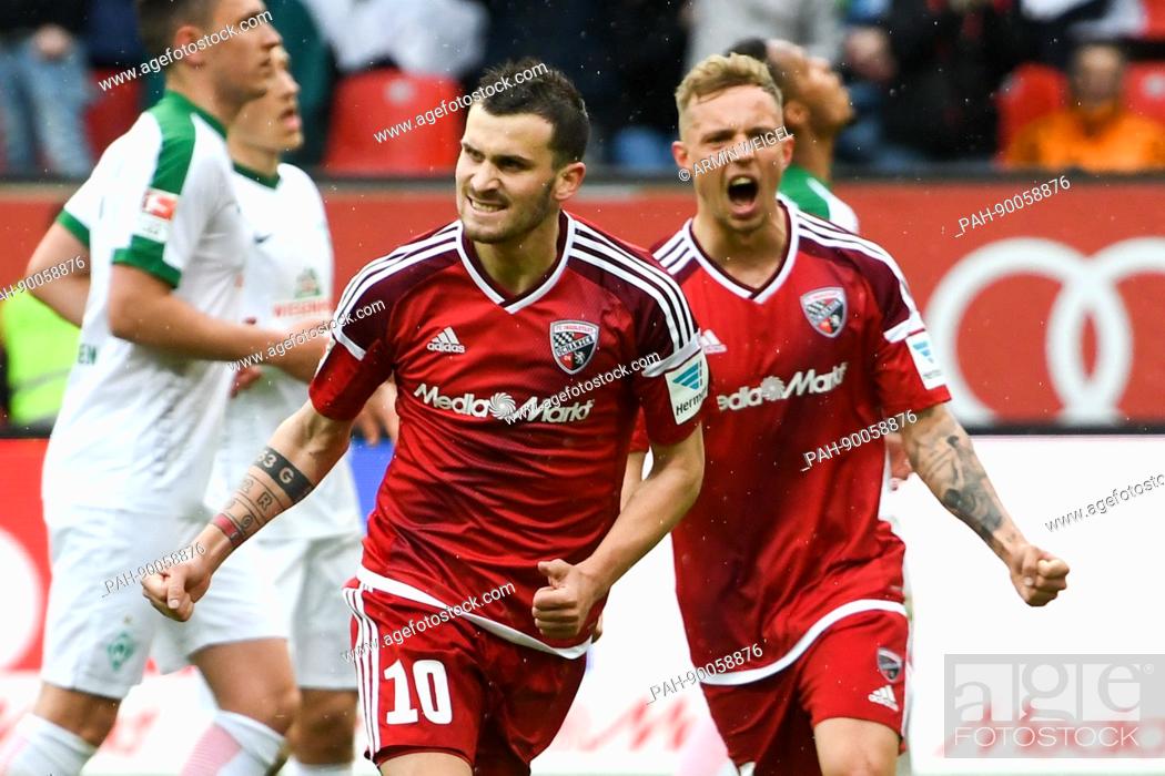 Stock Photo: Ingolstadt's Pascal Groß and Sonny Kittel cheers over his 2-1 penalty score during the German Bundesliga soccer match between FC Ingolstadt and Werder Bremen in.