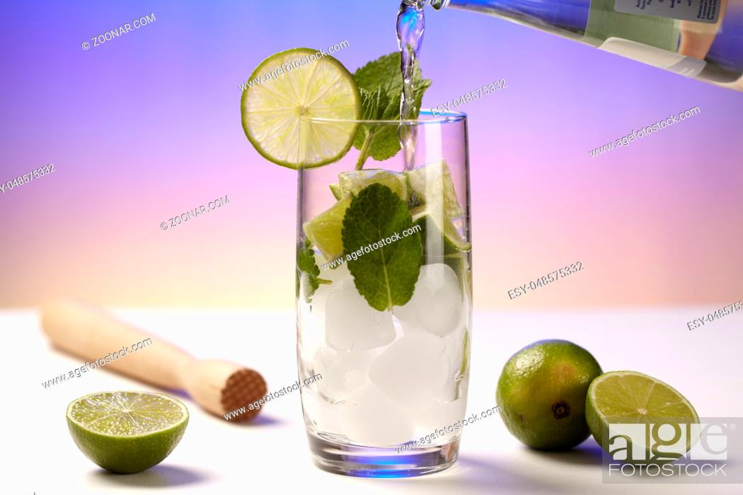 Stock Photo: Food, Water, Sweet, Nutrition, Diet, Beverage, Drink, Slice, Ice, Drinking Glass, Glass, Bottle, Refreshment, Citrus Fruit, Refreshing, Mint, Mineral, Aqua, Pouring, Lime - Fruit, Vessel, Glas, Acid, Collecting, Mineral Water, Ice Cube, Peppermint, Pestle, Eis, Fizz