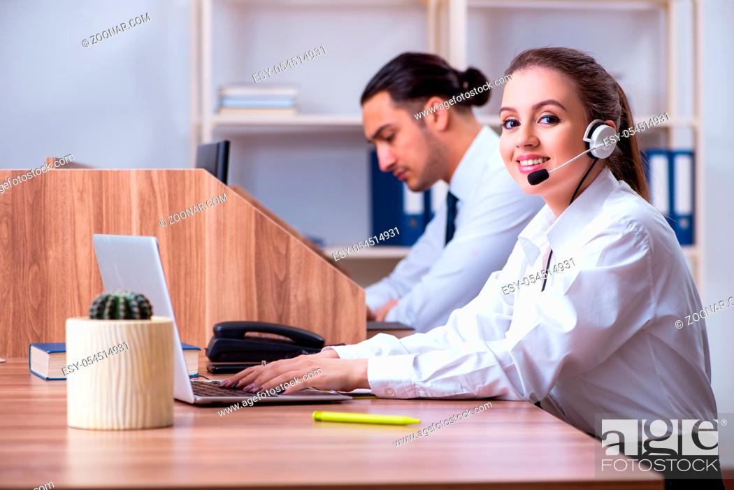 Stock Photo: The call center operators working in the office.