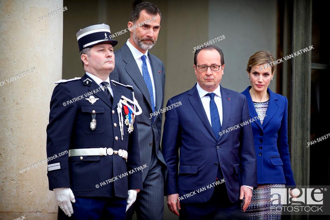 Stock Photo: French President Francois Hollande, Spain's King Felipe VI and Queen Letizia leave the Elysee Palace to deliver a statement after their meeting in Paris, France.