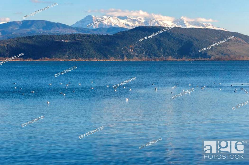 Stock Photo: Amazing winter Landscape of Lake Pamvotida and Pindus mountain from city of Ioannina, Epirus, Greece.