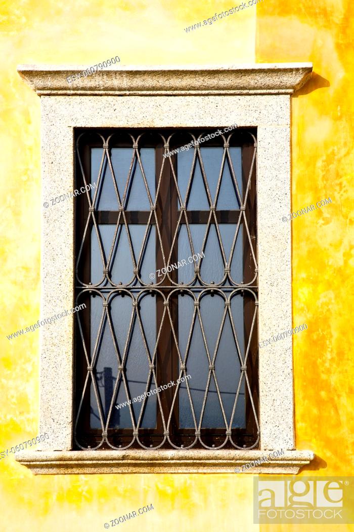 Stock Photo: shutter europe italy lombardy    in the milano old  window closed brick   abstract grate.