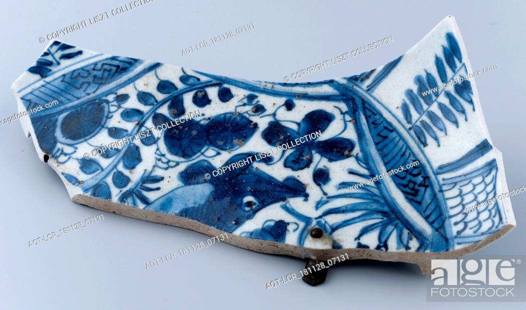 Stock Photo: Fragment Chinese porcelain dish repaired with staples, plate dish crockery holder soil find ceramic porcelain brass copper metal, w 8.