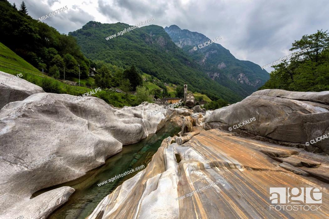 Stock Photo: The rocks on the bed of river Verzasca and the church of Lavertezzo, Valle Verzasca, Canton Ticino, Switzerland.