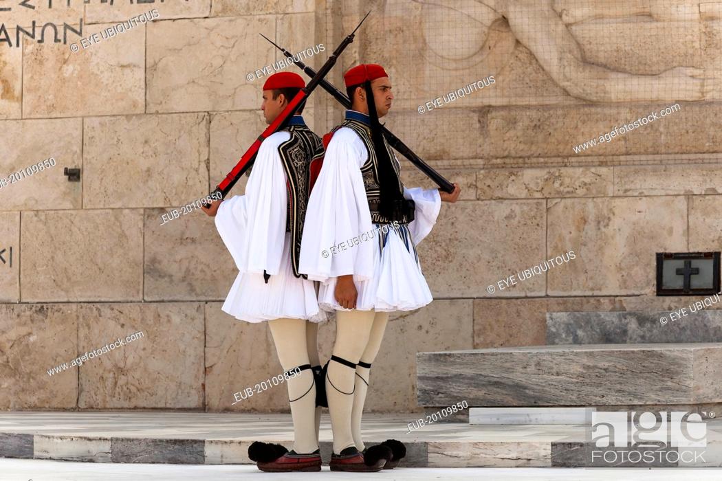 Stock Photo: Greek soldiers, Evzones, beside Tomb of the Unknown Soldier, outside Parliament building.