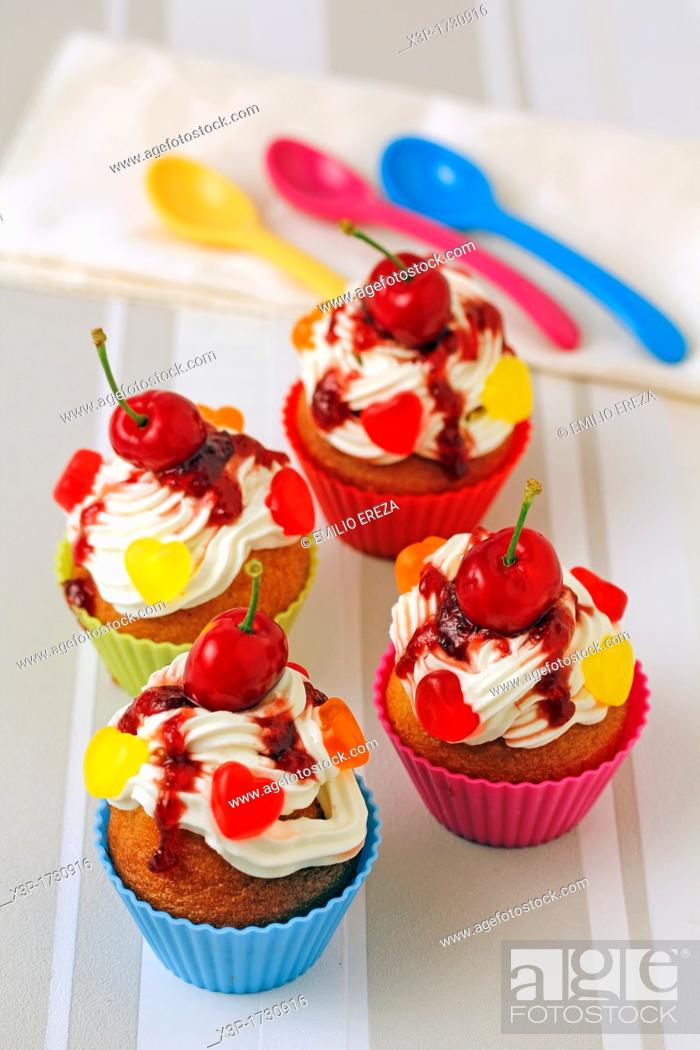 Stock Photo: Cupcakes with cherries.