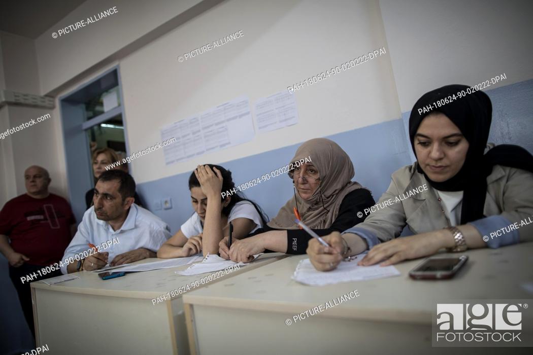 Stock Photo: Ballots are being counted after polls closed for the 2018 Turkish snap twin elections at a polling station in Istanbul, Turkey, 24 June 2018.