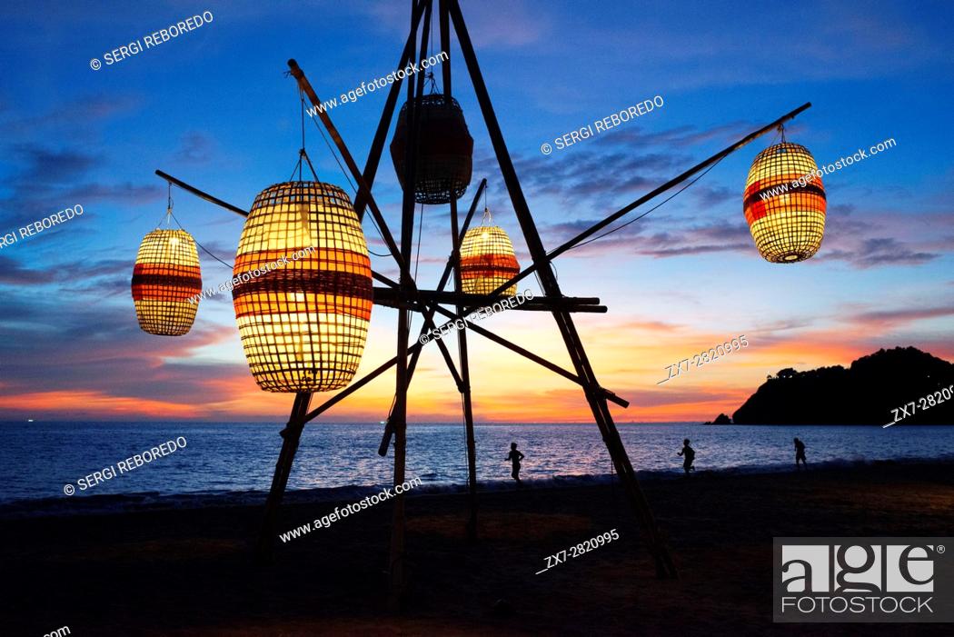 Stock Photo: Paper lights and sunset in the beach. Kantiang Bay. Koh Lanta. Thailand. Asia. NOON Sunset Viewpoint Restaurant. Kantiang Bay is most famous as the location of.