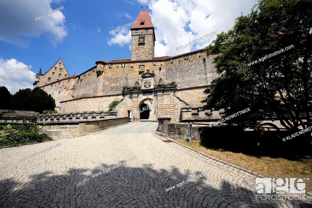 Stock Photo: Former drawbridge to Veste Coburg with bulgarian tower. The Veste Coburg, also known as the ""Frankish Crown"", rises high above the city with its huge walls.