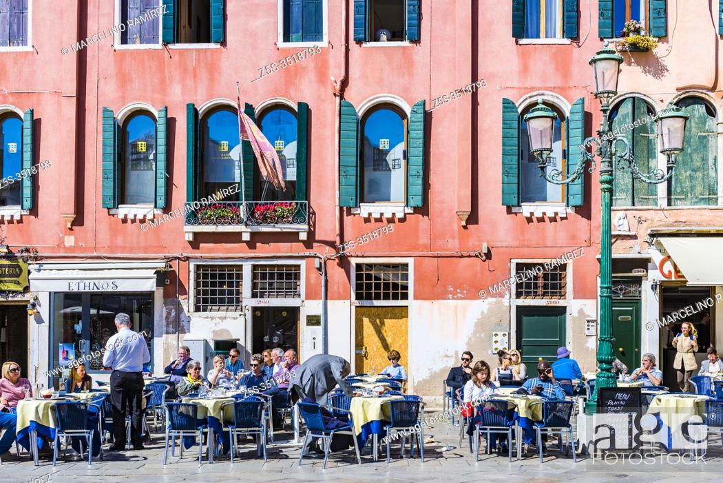 Stock Photo: Lively terraces in the Campo Santo Stefano is a city square near the Ponte dell'Accademia, in the sestiere of San Marco. Venice, Veneto, Italy, Europe.